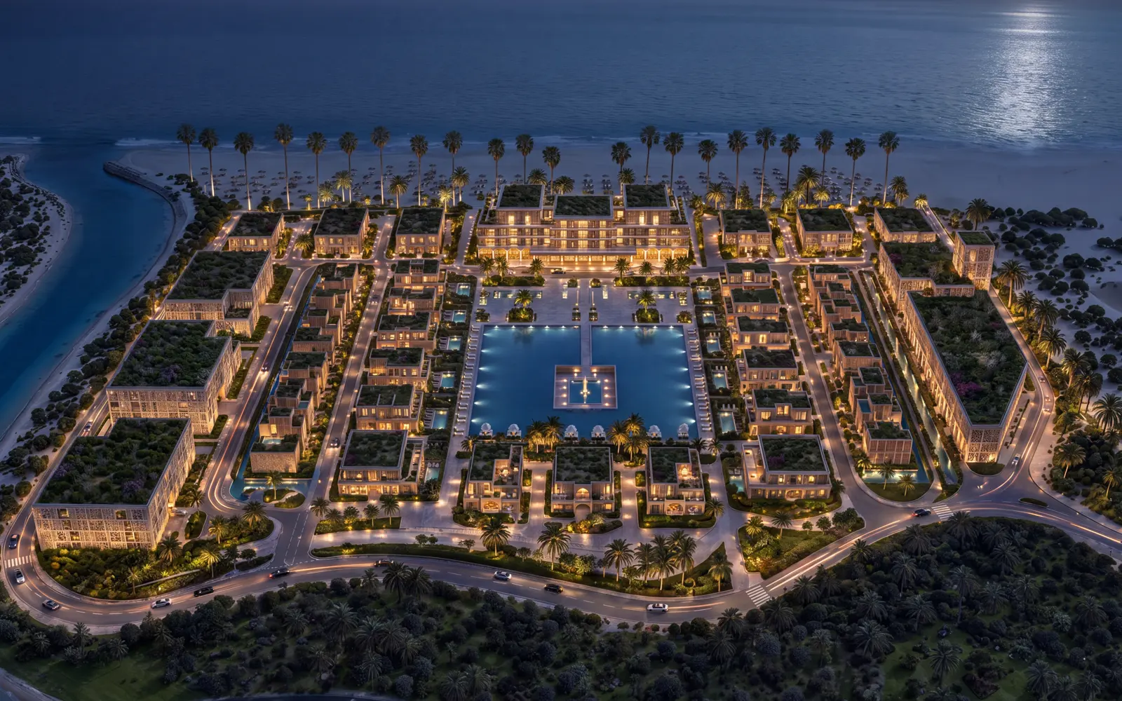 Mira Ocean Estates lit at dusk beside the Arabian Sea