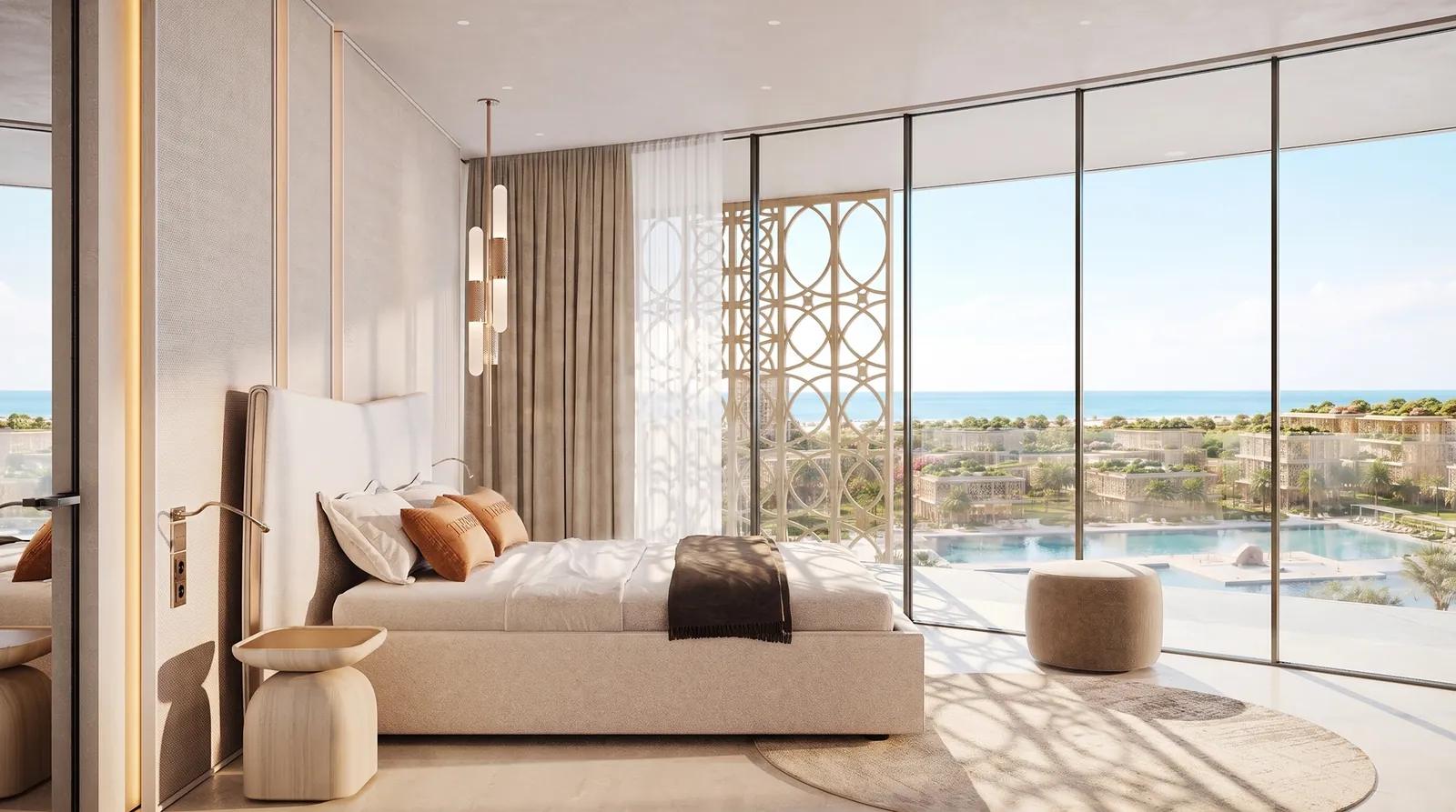 Bedroom with floor-to-ceiling glazing over the central pool and the sea