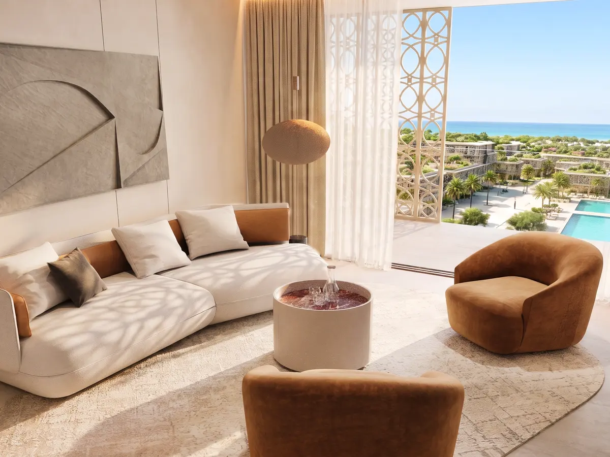 Living room with sea view beyond the mashrabiya screen