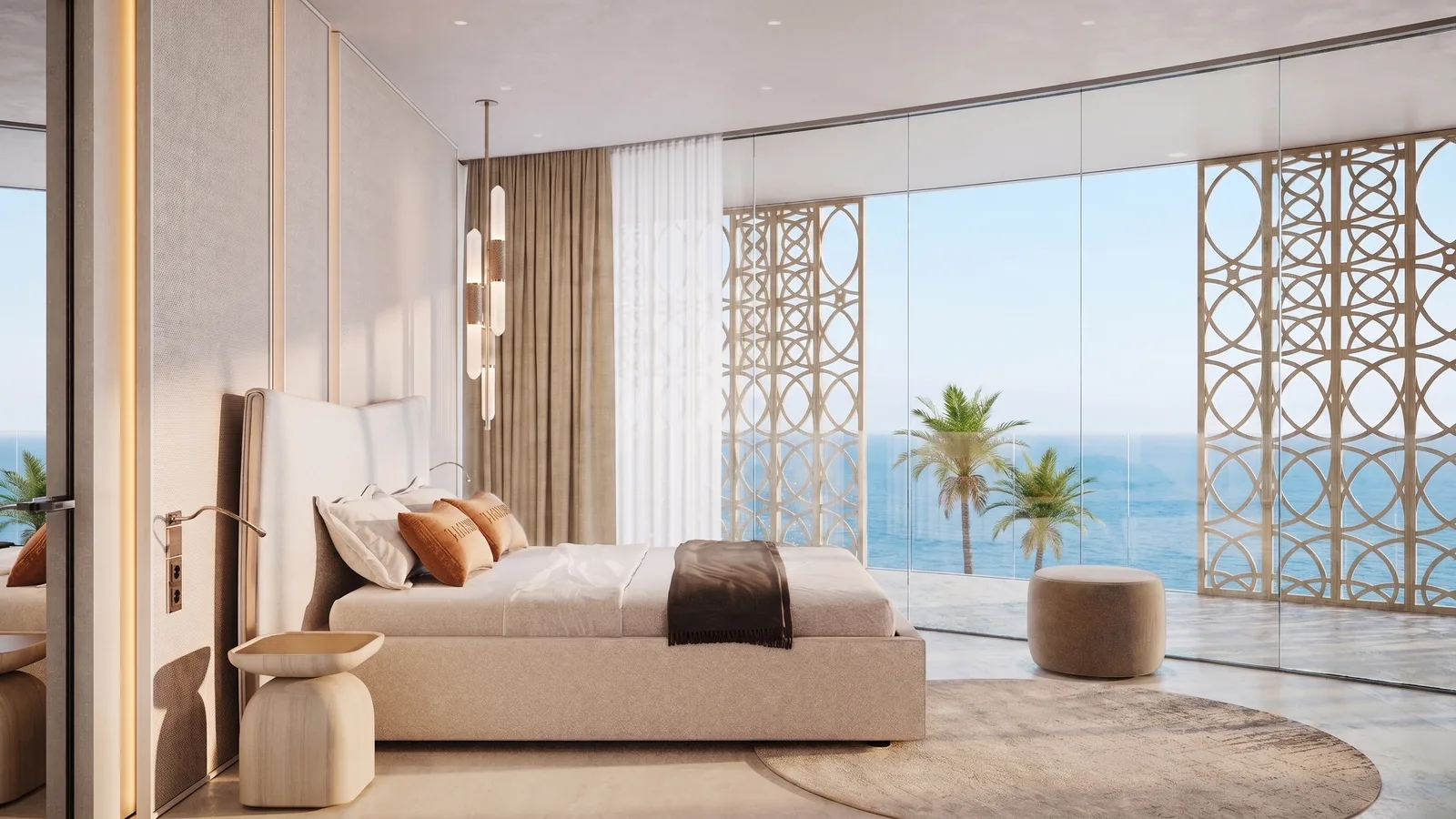 Bedroom with floor-to-ceiling glazing above the beach