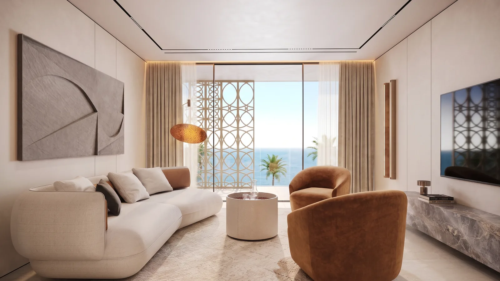 Living room with a stone media wall and the sea beyond